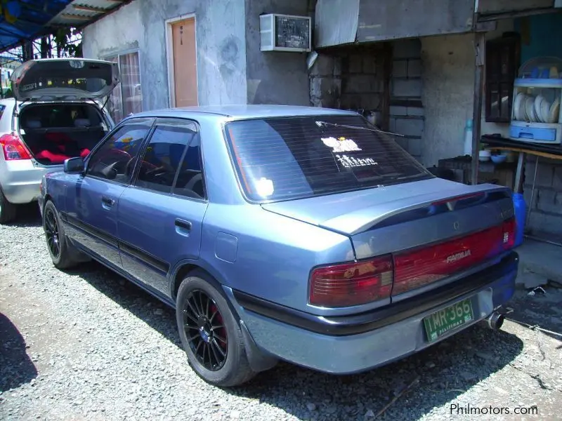 Mazda  Familia 1.8 3