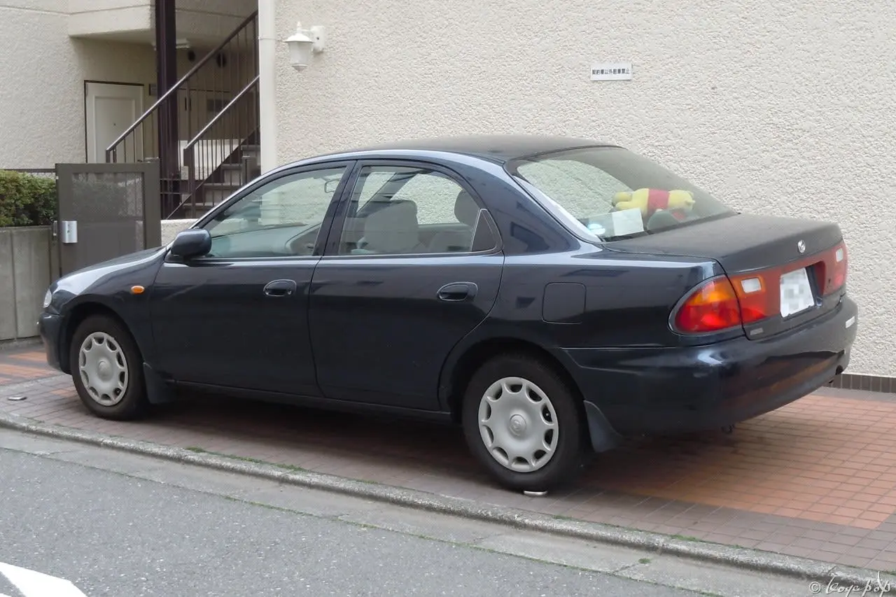 Mazda  Familia 1.8 6
